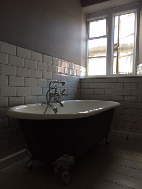 Reclaimed Bath in Street